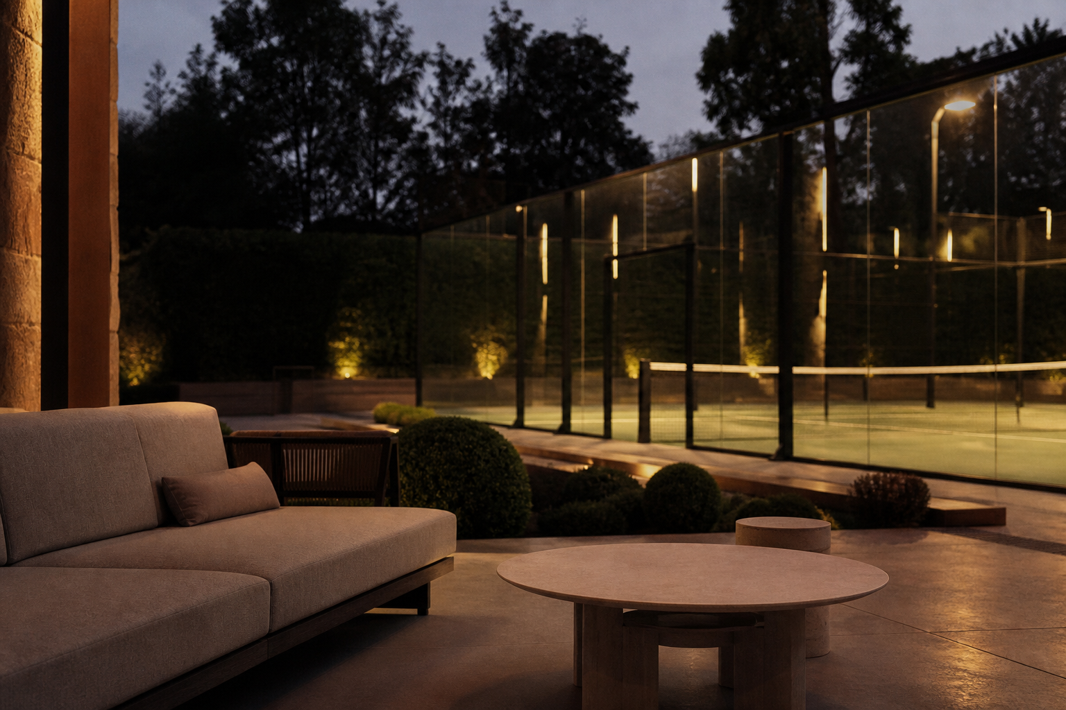 Evening terrace lounge beside a luxury home padel court